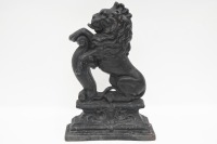 LION RAMPANT: An antique cast iron Lion Rampant door stop, measures 37cm high