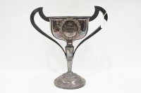 TROPHY: A large Electro-Plated Nickel Silver Lewbury double handled trophy cup, engraved 'The E.A.Palmer Memorial Cup. Measures 40cm high