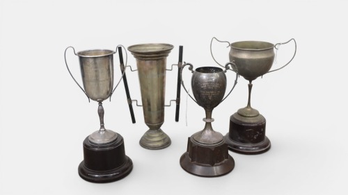 TROPHIES: A group of four cup-style trophies, three mounted to bakelite bases, the largest measures 35cm tall
