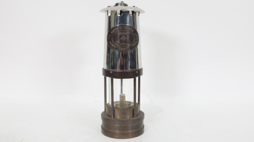 MINERS LAMP: A c1950s E. Thomas & Williams Cambrian brass miners lamp, with serial number '12391' on nameplate, 26cm high