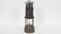 MINERS LAMP: A c1950s E. Thomas & Williams Cambrian brass miners lamp, with serial number '12391' on nameplate, 26cm high