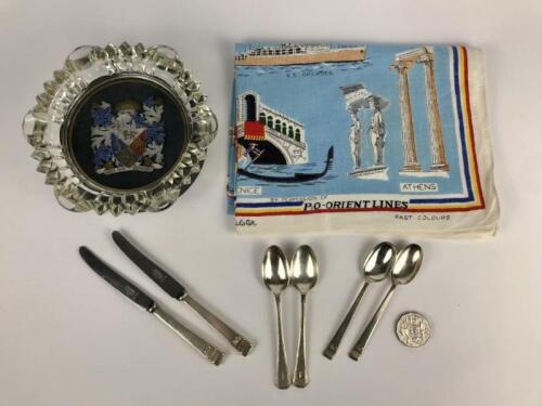 P&O: Eight items: A 'Sunshine Cruises' full colour tea towel 78cm x 50cm, P&O glass ashtray on stand, and 6 P&O branded cutlery, 2 knives and 4 tea spoons.