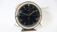 METAMEC CLOCK: A c1960s Metamec (Britain) electric powered shelf clock, diameter 18cm overall