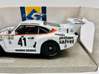PORSCHE 935: A 1:18 scale model of the 1979 Le Mans winning Porsche 935 K3 together with a famed photo signed by Alan Jones and two posters [Location: Sydney] - 4