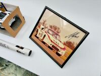 PORSCHE 935: A 1:18 scale model of the 1979 Le Mans winning Porsche 935 K3 together with a famed photo signed by Alan Jones and two posters [Location: Sydney] - 7