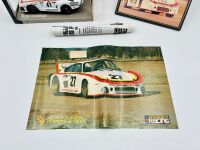 PORSCHE 935: A 1:18 scale model of the 1979 Le Mans winning Porsche 935 K3 together with a famed photo signed by Alan Jones and two posters [Location: Sydney] - 8
