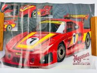 PORSCHE 935: A 1:18 scale model of the 1979 Le Mans winning Porsche 935 K3 together with a famed photo signed by Alan Jones and two posters [Location: Sydney] - 9