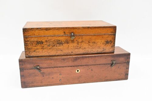 BOXES: Two antique timber boxes with dovetail joints, each with brass mountings, largest 40.5cm wide