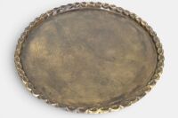 COFFEE TABLE: A large Middle Eastern style brass tray form coffee table on timber base, featuring a lion in foliage, diameter 77cm, 44cm high - 2