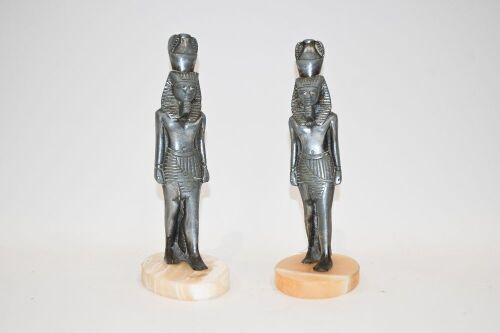 EGYPT: A pair of circa 1960's Egyptian pharaoh bookends in metal and onyx, 23cm high each