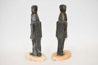 EGYPT: A pair of circa 1960's Egyptian pharaoh bookends in metal and onyx, 23cm high each - 3