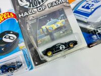 HOT WHEELS: Four Hot Wheels 1:64 scale models including two of the Ford GT40 and two of the Porsche 935 [Location: Sydney] - 2