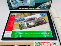 MOTORSPORT: A group of items featuring various forms of automobile racing including a Sauber Mercedes Le Mans print on board together with two framed Aston Martin and Ferrari pictures, a Panoz poster and a Porsche photo [Location: Sydney] - 4