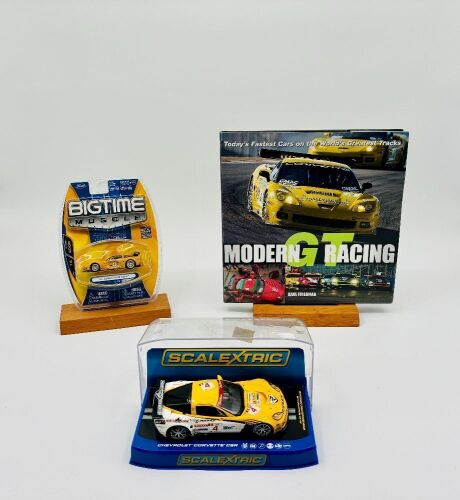 167 · CORVETTE C6R: A 1:32 scale Corvette C6R slot car by Scalextric together with a 1:64 scale Corvette C6R model by Jada/Bigtime Muscle and a hardcover book 'Modern GT Racing' by Dave Friedman [Location: Sydney]