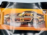 MERCEDES-BENZ: A 1:32 scale slot car of the SLS AMG by SCX with original packaging, together with 3 posters of the Erebus SLS [Location: Sydney] - 5