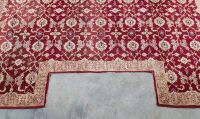 RUG: A large Persian-style rug with a cutout for a fireplace or furniture measures approx 416cm by 362cm overall - 4
