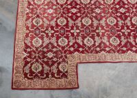 RUG: A large Persian-style rug with a cutout for a fireplace or furniture measures approx 416cm by 362cm overall - 5