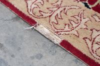 RUG: A large Persian-style rug with a cutout for a fireplace or furniture measures approx 416cm by 362cm overall - 9
