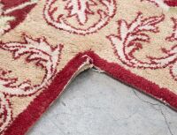 RUG: A large Persian-style rug with a cutout for a fireplace or furniture measures approx 416cm by 362cm overall - 12