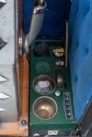 CASINO/ROLLS-ROYCE: A travelling casino kit in a Crooks trunk, includes a c1950s Silver Jubilee poker machine (with Rolls-Royce symbols) and small roulette wheel, trunk 76cm high, - 9