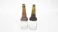 SHELL: Two original Shell upper cylinder lubricant glass bottles, each with tin pourers