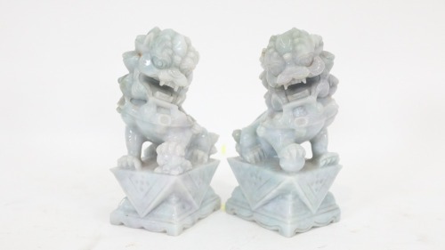 BOOKENDS: A pair of stone Chinese dragon bookends, 17cm high