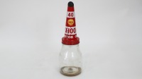 SHELL: An original Shell 'X-100' 40 weight tin top pourer on a one imperial pint glass oil bottle