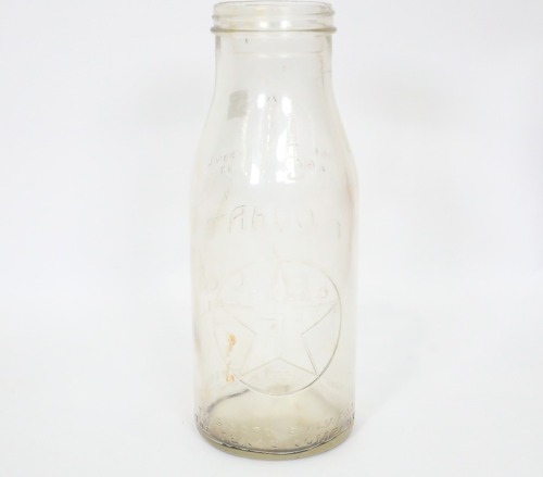TEXACO: An original embossed one quart Texaco glass oil bottle