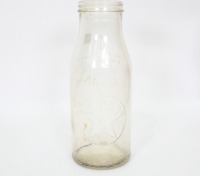 TEXACO: An original embossed one quart Texaco glass oil bottle