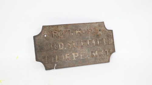 PLAQUE: A cast iron plaque reading 'Rht Hon Lord Suffield Thorpe Mkt', measures 16cm high, 31cm wide