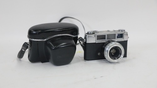 CAMERA: A c1960s Yashica (Japan) Minister 35mm camera in original black leather case