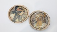 GOEBEL ARTIS: A pair of small porcelain plates by Goebel Artis Orbis, one titled 'Blonde, 1897', the other 'Brunette, 1897' measuring 9.5cm in diameter