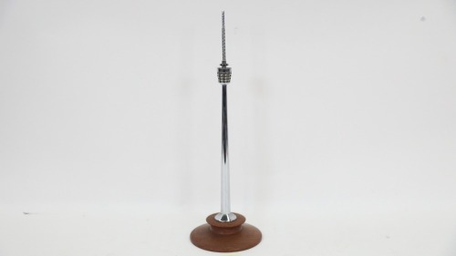 CENTREPOINT TOWER: A possible late 1970s small display piece believed to be of Sydney's Centrepoint Tower mounted on round timber base, 37cm high overall