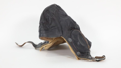 R.N.Z.A.F: A c1940 Royal New Zealand Air Force leather flying helmet, marked 'JMU 427397'