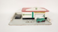 BP: A c1960s-1970s BP Energol timber children's service station, features opening garage door, petrol pumps in forecourt and comes with Matchbox King Size BP Service Foden truck