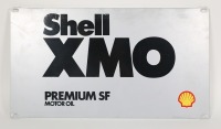 SHELL: A c1980s Shell XMO metal oil bottle rack sign, 27cm high, 48cm wide