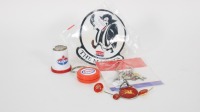 PETROLEUM: A group of petroleum-related items, including two Esso keyrings, an Amoco coin holder, an Ampol VFL Magpies sticker, and others