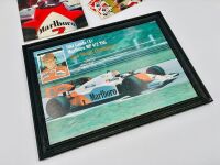 MCLAREN: A framed print of Niki Lauda and his MP4/2 together with four stickers and a copy of 'Kimberley' Grand Prix Team Guide No.5; McLaren' by Bob Constanduros [Location: Sydney] - 2