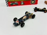 FORMULA 1: Five Formula One 1:64 scale models including a Cooper Maserati by Corgi, two Maserati 4CLT by Matchbox, a Lotus by Matchbox, a Lotus Type 49 by Hotwheels together with a Nova Brix kit of the Brabham BT19 [Location: Sydney] - 2