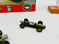 FORMULA 1: Five Formula One 1:64 scale models including a Cooper Maserati by Corgi, two Maserati 4CLT by Matchbox, a Lotus by Matchbox, a Lotus Type 49 by Hotwheels together with a Nova Brix kit of the Brabham BT19 [Location: Sydney] - 5