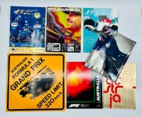 AUSTRALIAN GRAND PRIX: Six Aus GP event programmes between the years of 1999 and 2000 together with a sign [Location: Sydney]