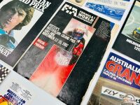 AUSTRALIAN GRAND PRIX: Seven Aus GP programmes from the 1980s together with a 2013 review of the 1955 race and four stickers [Location: Sydney] - 7
