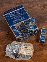 SPARK PLUGS: A NOS vintage box of 12 Champion Y-4-A 10mm spark plug, in original boxes and in larger advertising box