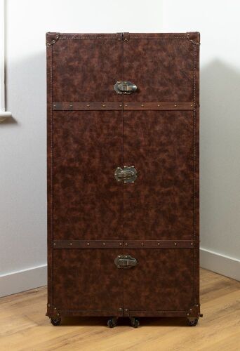88 · WARDROBE: A large upright faux steamer trunk storage wardrobe, with bi-folding front section on castors, 153cm high, 79cm wide, 69cm deep
