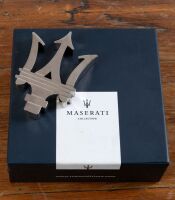 MASERATI: A Maserati Trident paperweight in fitted Maserati branded box