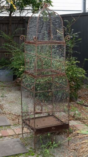 137 · BIRDCAGE: A tall modern pagoda style metal birdcage
