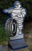 MICHELIN: A circa 1990s Michelin Bibendum plastic service station display sign