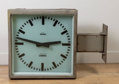 155 · RAILWAY CLOCK: A large KZA Zielonka (Poland) electric railway clock, with fixed wall mounting bracket, 63cm high, 90cm wide, 29cm deep
