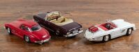MERCEDES: Three 1:18 scale Burago models of 300SL roadsters and 1966 280 SE Cab, - 2