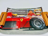 FERRARI: A 1:18 scale Bburago model of the 312 T4 and a 1:43 scale model of the 312T together with a Michele Albereto poster [Location: Sydney] - 6